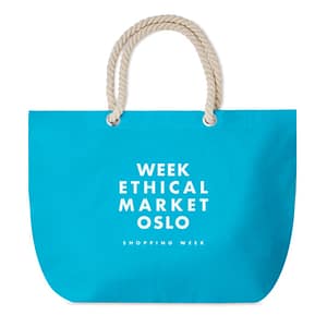 Tote bag with logo MENORCA Tote bag with logo in cotton 220 gr/m². Beach bag or shopping bag with cord handle. Depending on the surface we can use embroidery, engraving, 360° imprint or screen print.