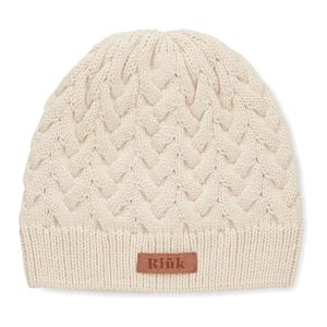 Beanie with label KATMAI Cable knit beanie in RPET with label for printing area. Stylish beanie with a knitted pattern made from recycled PET plastic. The beanie has a contrasting label in front. Perfect to keep warm during the colder days. Magnus Business Gifts is your partner for merchandising, gadgets or unique business gifts since 1967. Certified with Ecovadis gold!